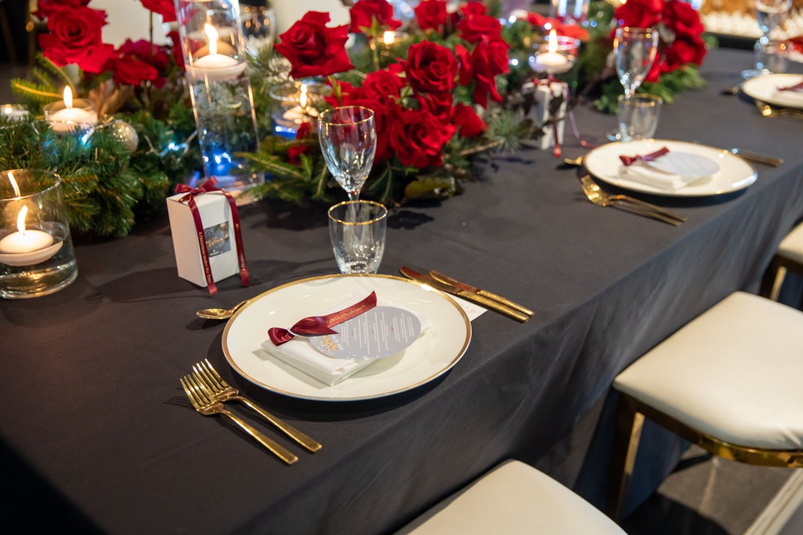 A table dressed by GD Events Group, roses and candlelight