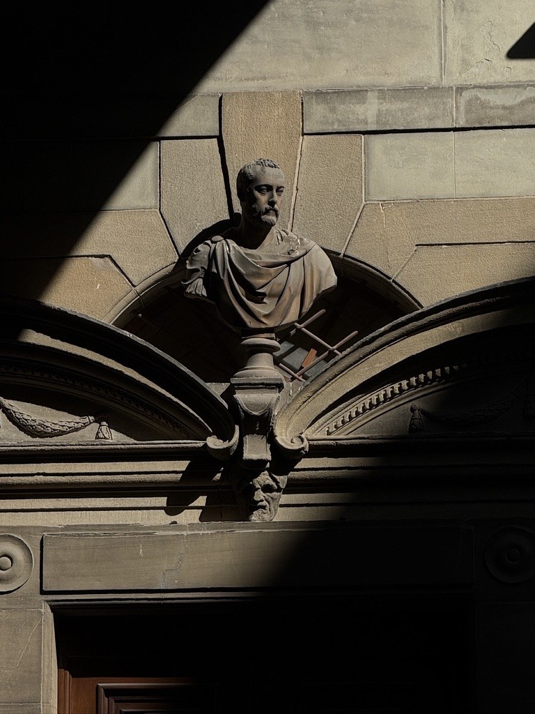 Carved stone in afternoon light, Florence